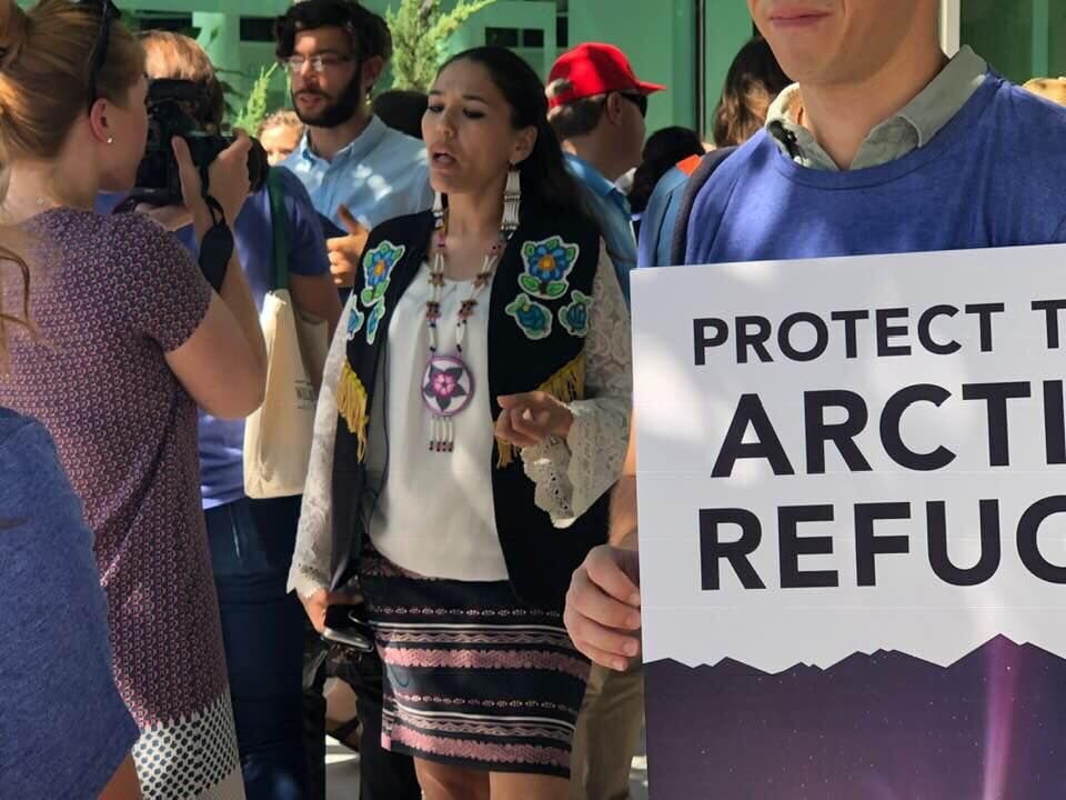 Advocate speaks at a Protect the Arctic Refuge rally